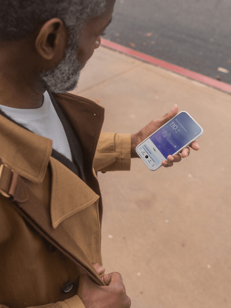 Woman looking at phone with data