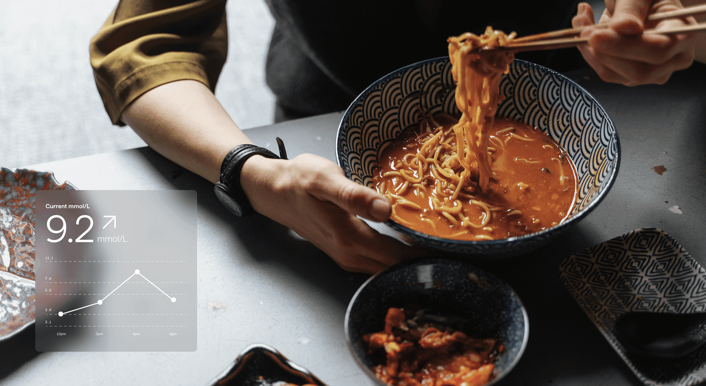 Person eating ramen noodles